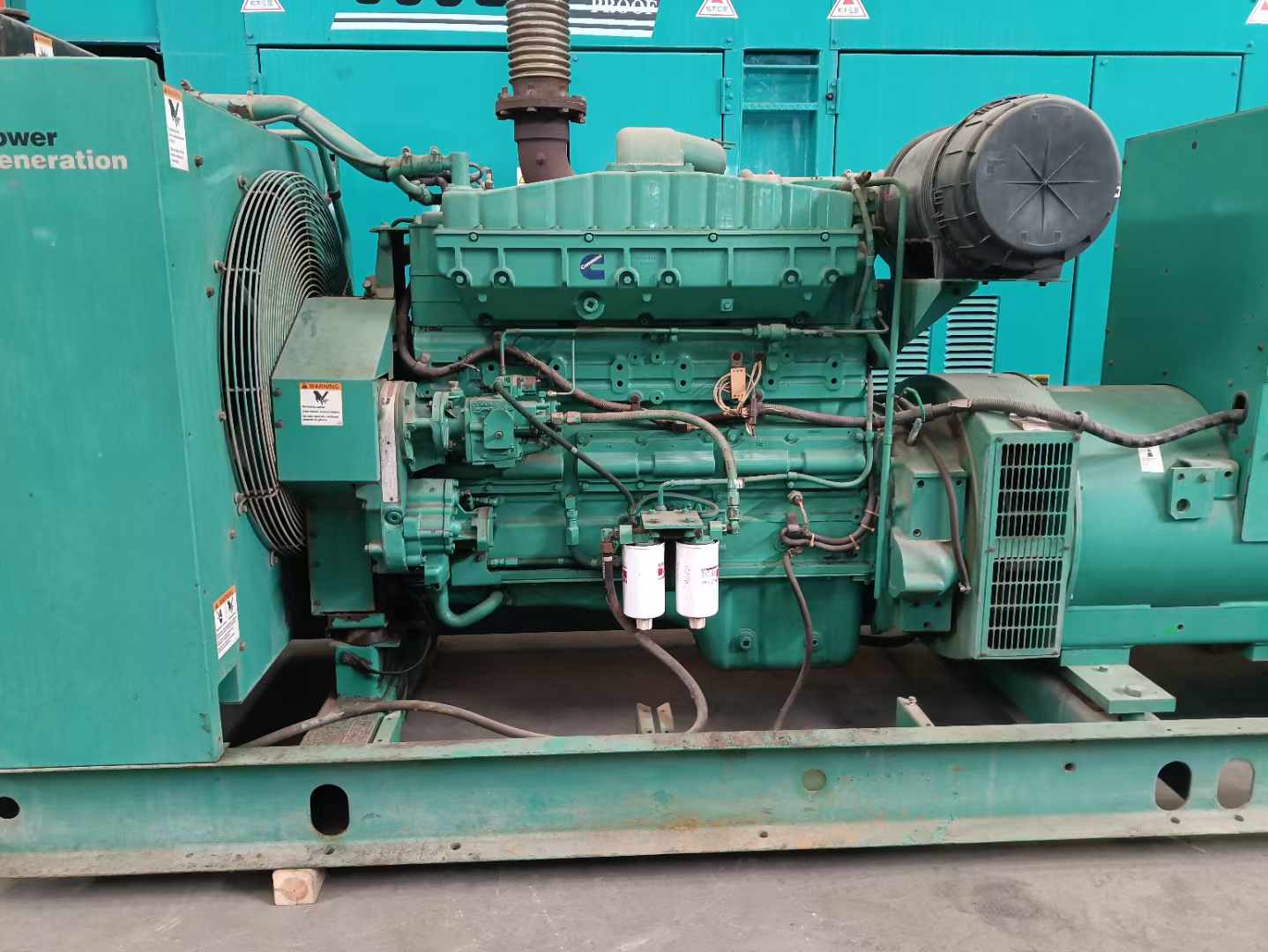 古塔过载会对 600kW 柴油发电机组造成哪些损害？